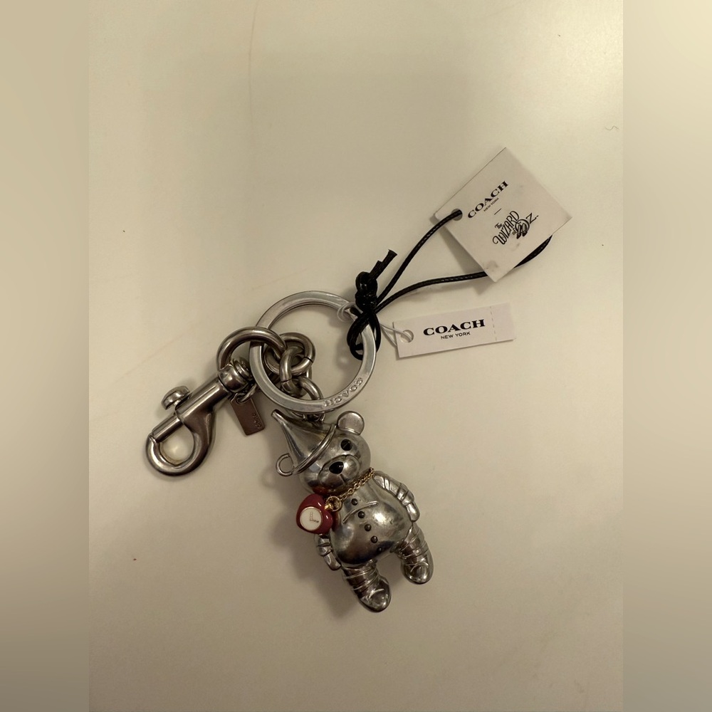 Rare and retired Coach Wizard of Oz tin man keychain